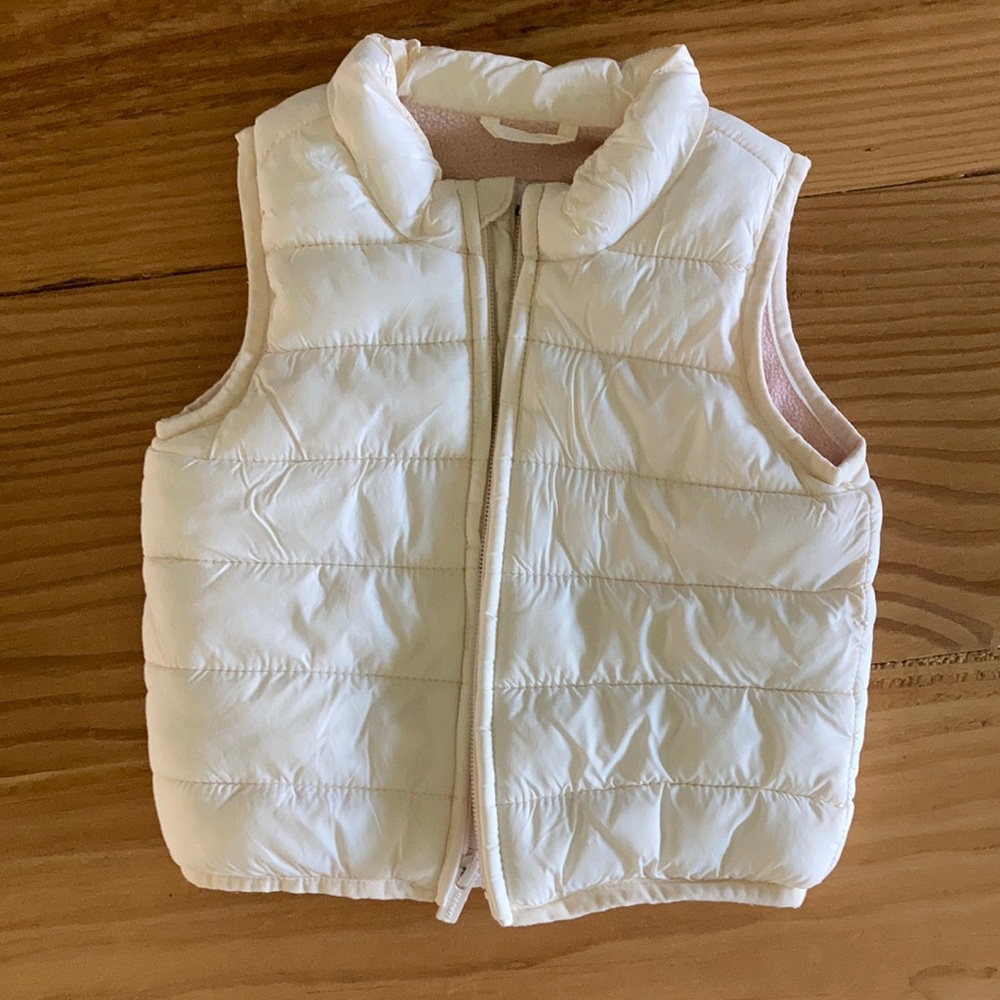 White and pink fleece vest